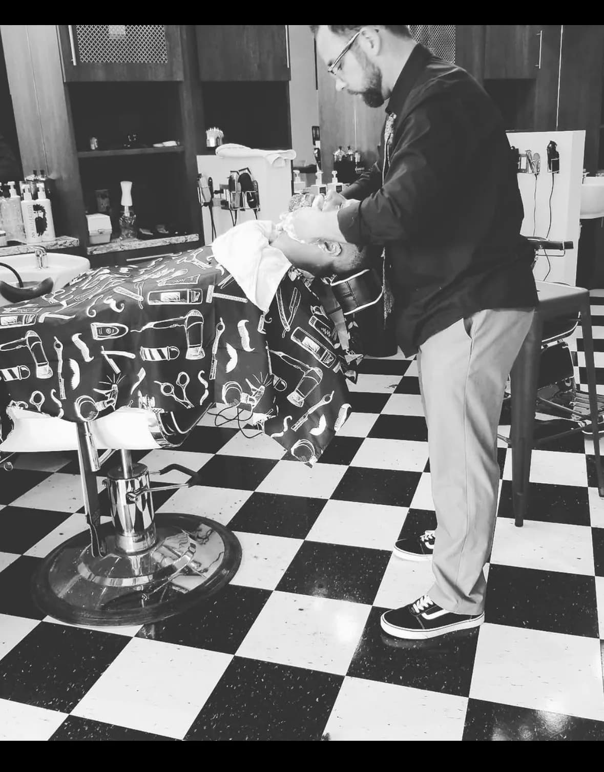 John giving a hot-towel shave